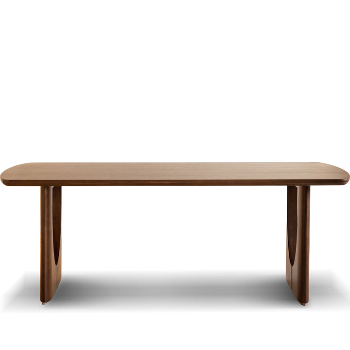 Vintage walnut wood dining table rockwel in white background.