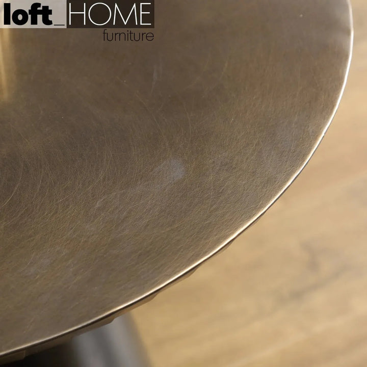 Vintage wooden round side table vintage brass in details.